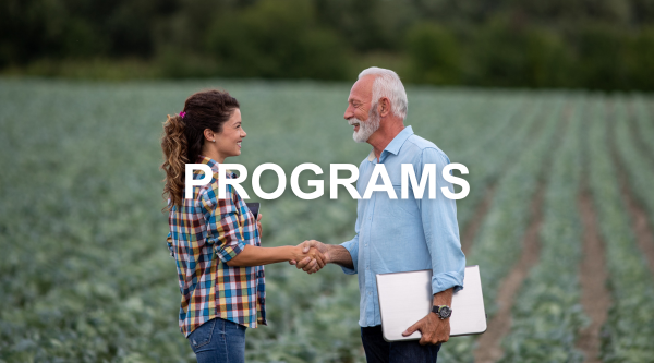Farmer shaking hands with Farm Credit loan officer